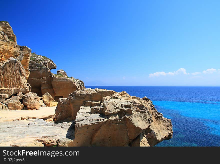 The old quarry tuff favignana now abandoned near the beautiful sea. The old quarry tuff favignana now abandoned near the beautiful sea