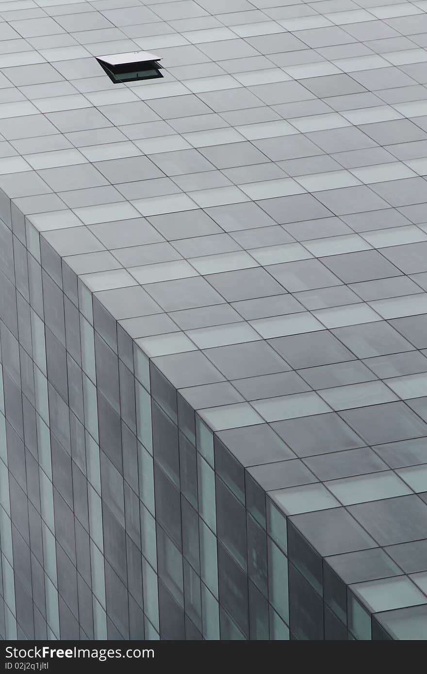 A single open window at an office building. A single open window at an office building