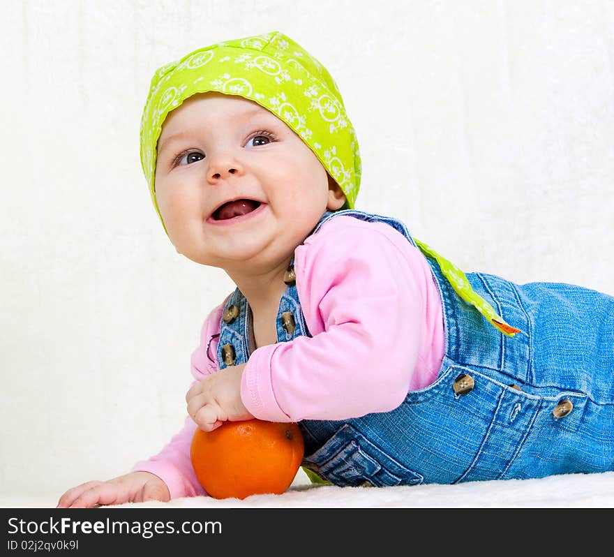 Happy baby girl at studio. Happy baby girl at studio