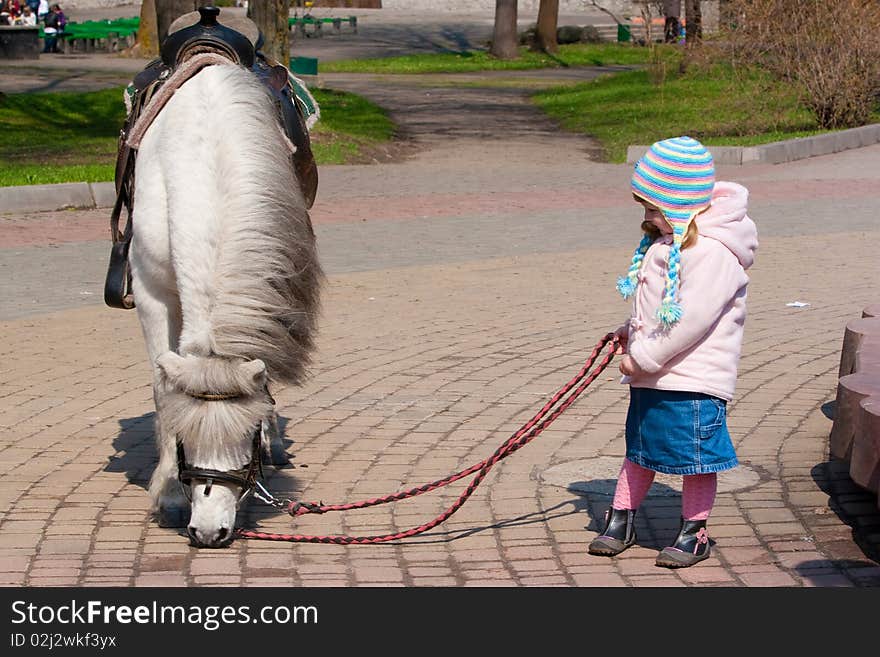 Child take a wolk in park