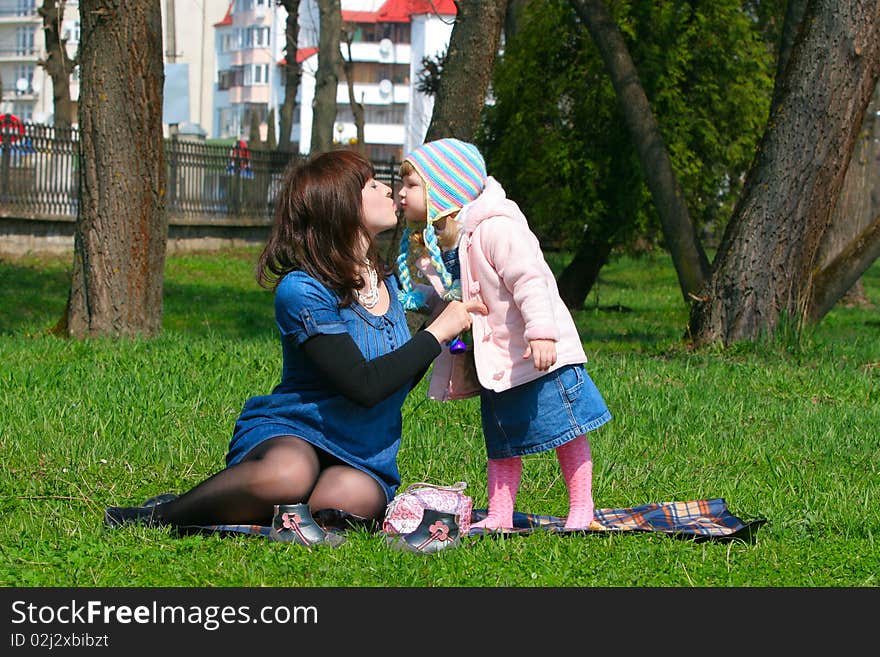 Mother and daughter have a picnic