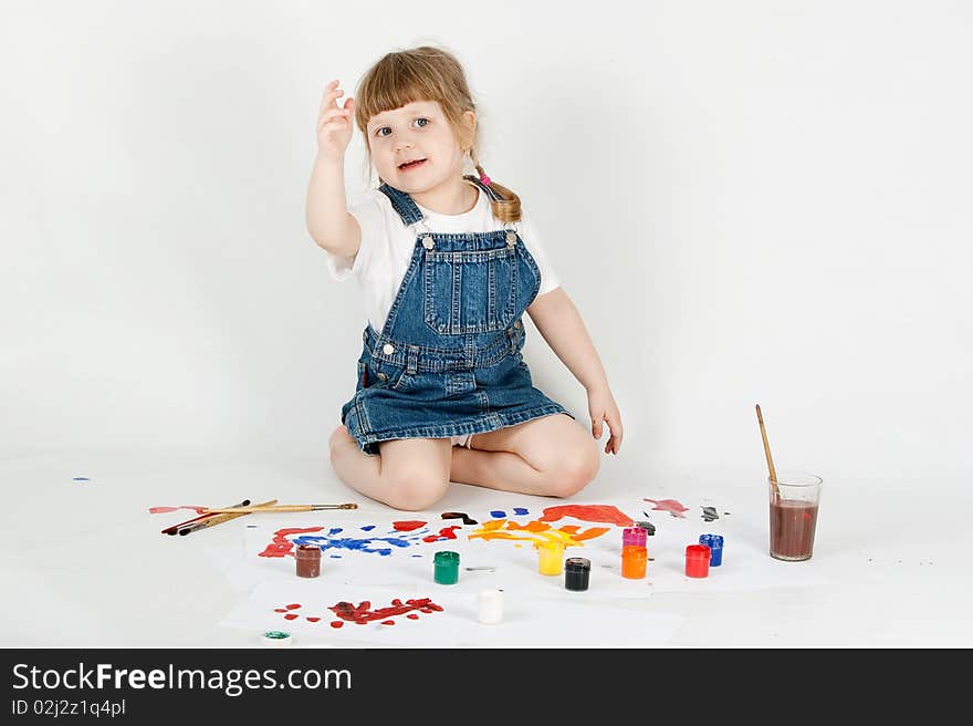 Girl painting on a white background