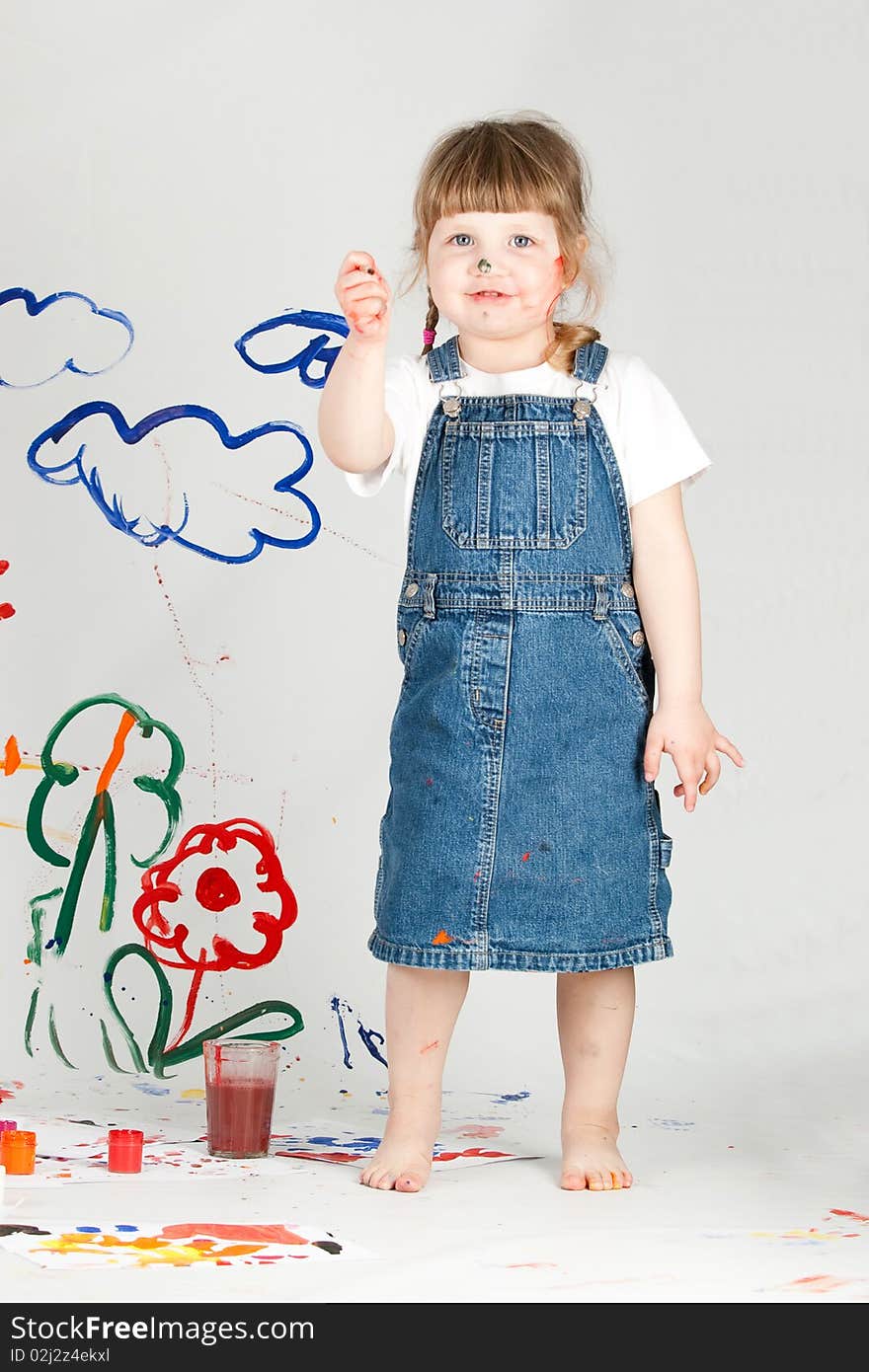 Girl painting on a white background