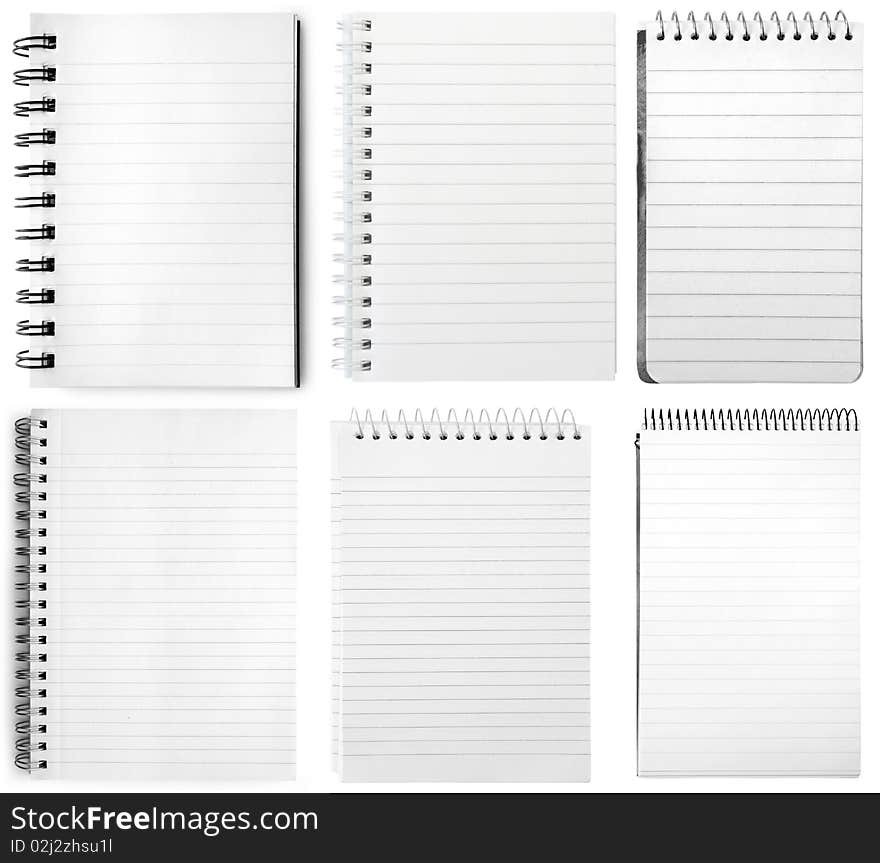 Collection  of six white notebooks isolated on white background. Collection  of six white notebooks isolated on white background