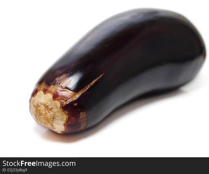 Fresh whole purple eggplant vegetable towards white background