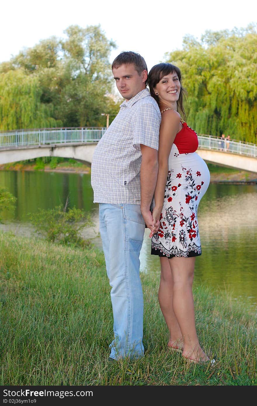 Happy pregnant woman with husband. Happy pregnant woman with husband