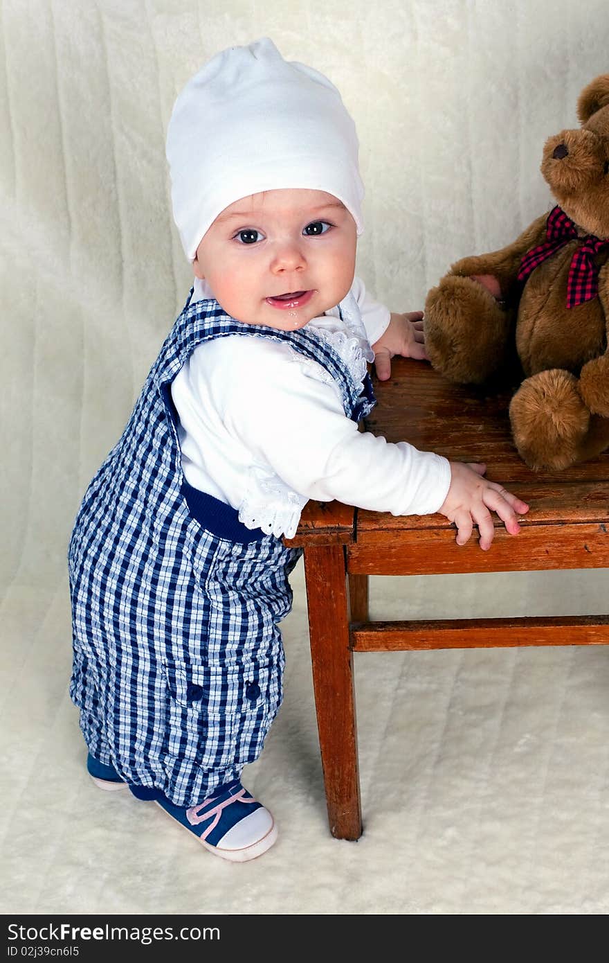 Happy child girl at studio