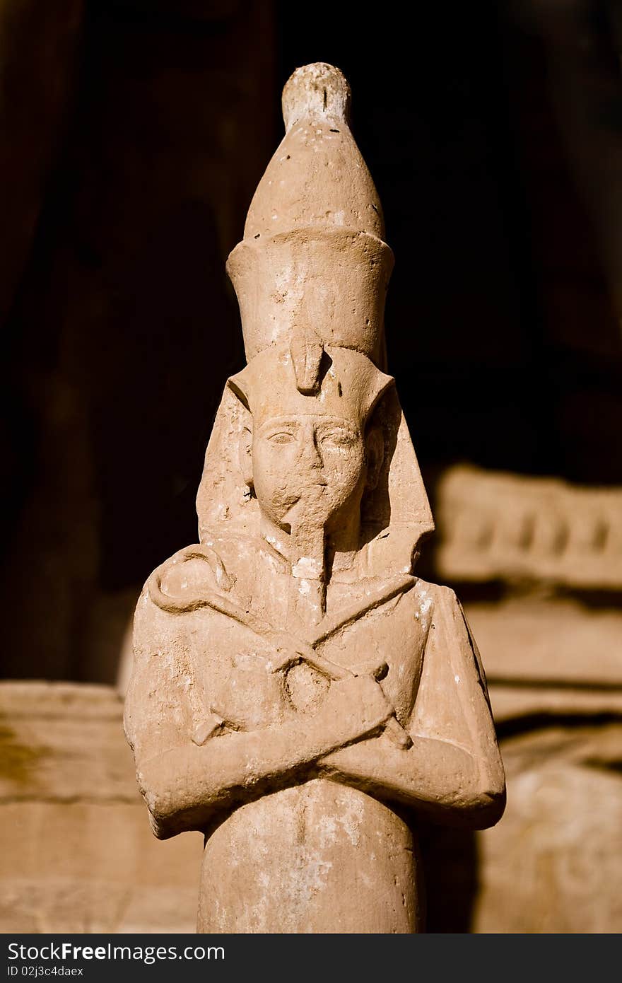 Stone statue in the temple of the Egyptian Pharaoh. Stone statue in the temple of the Egyptian Pharaoh