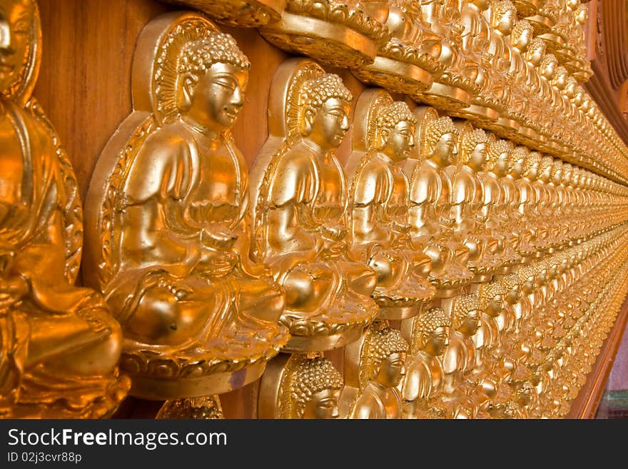 Ten thousand buddha on Chinese temple wall