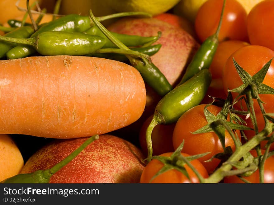 Carrot tomatoes and little green peppers. Carrot tomatoes and little green peppers