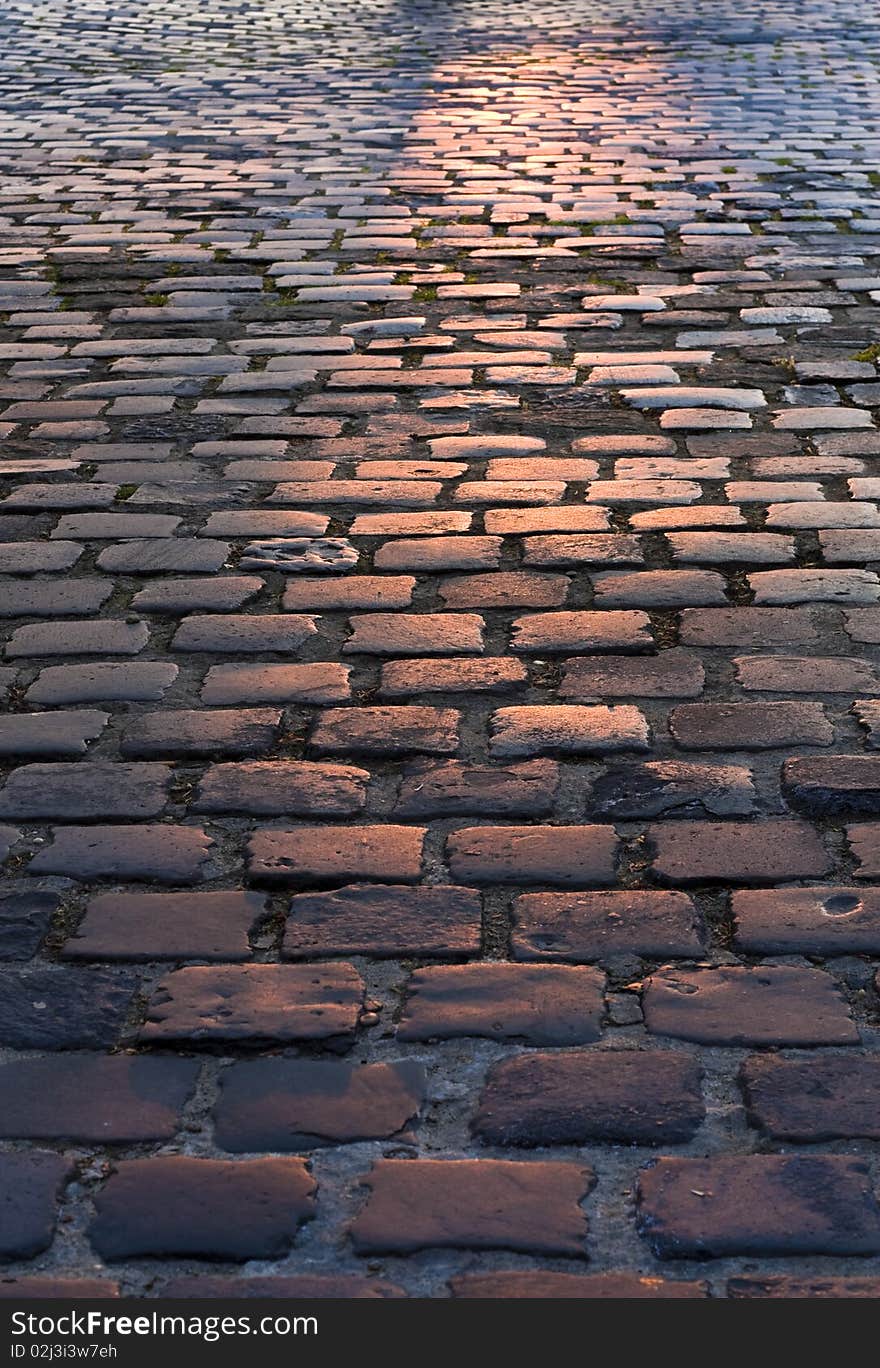 Cobbled, ancient city of stone road.