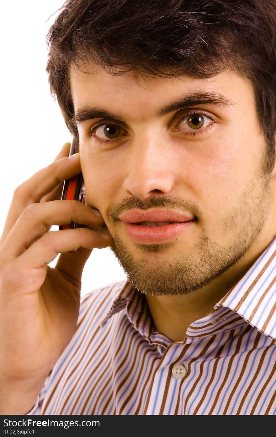 Close up portrait of young man on the phone, isolated on white