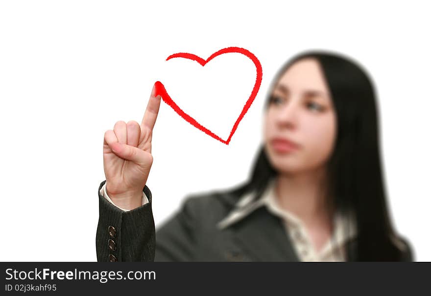 Young woman draws a heart shape on white background