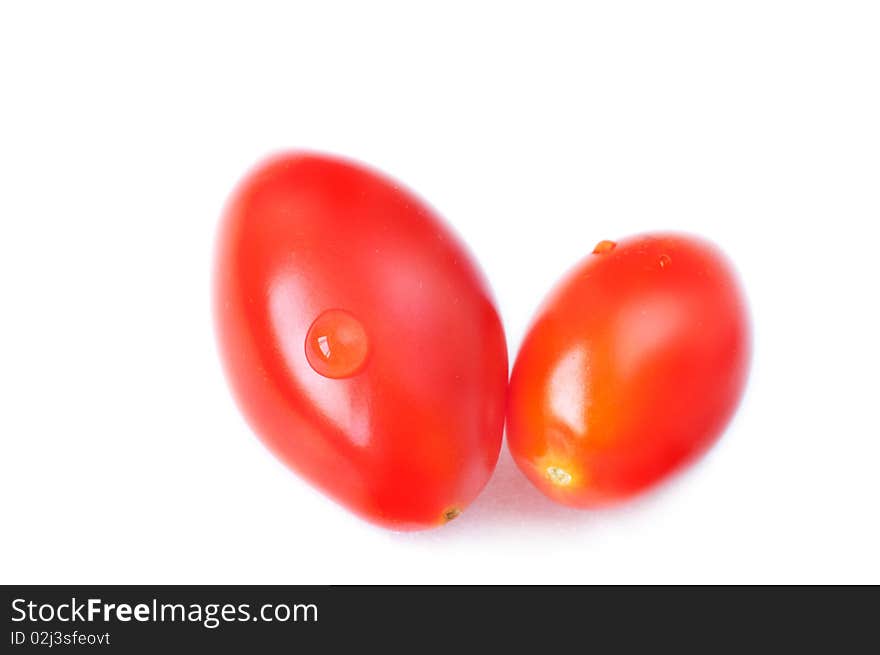 Two tomato with drop and isolated with white background