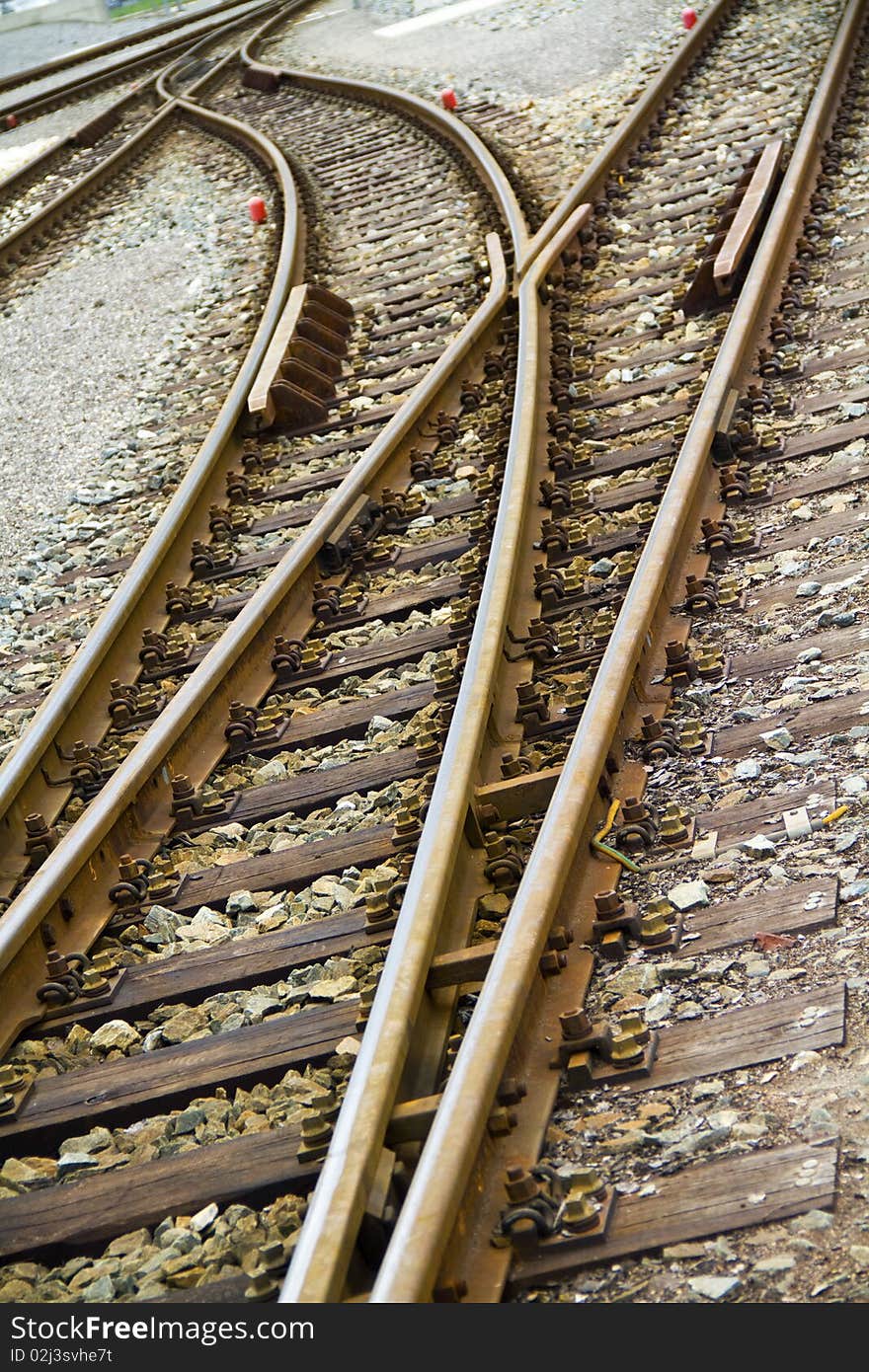 A particular crossing railway tracks. A particular crossing railway tracks