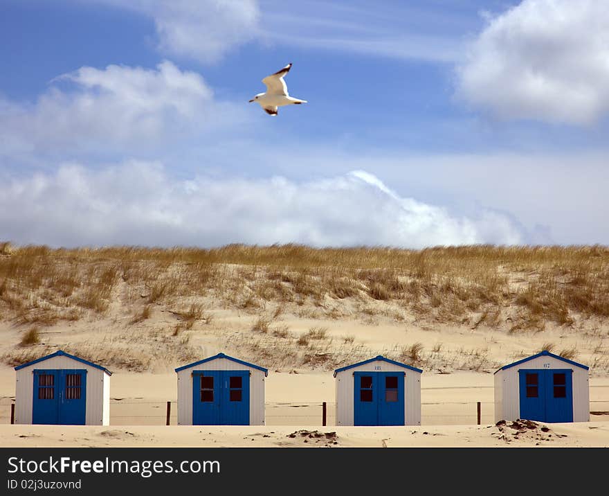 Houses on the beach with blue sky