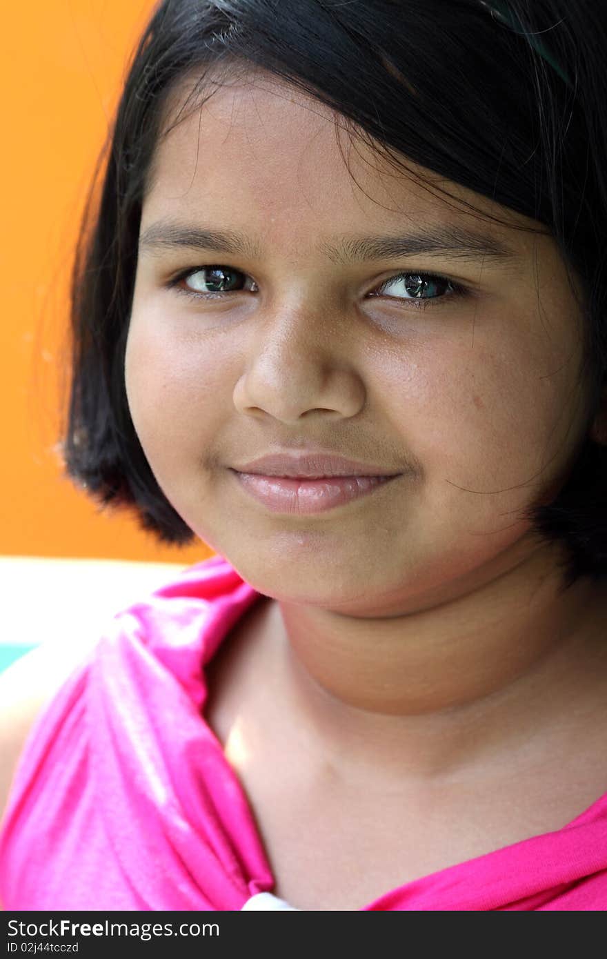 Portrait of a Teenage Girl Looking at Camera