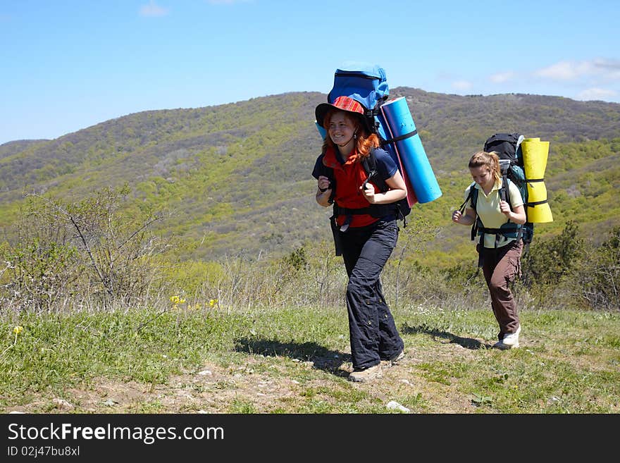 Hiker Girl Walking In Mountains