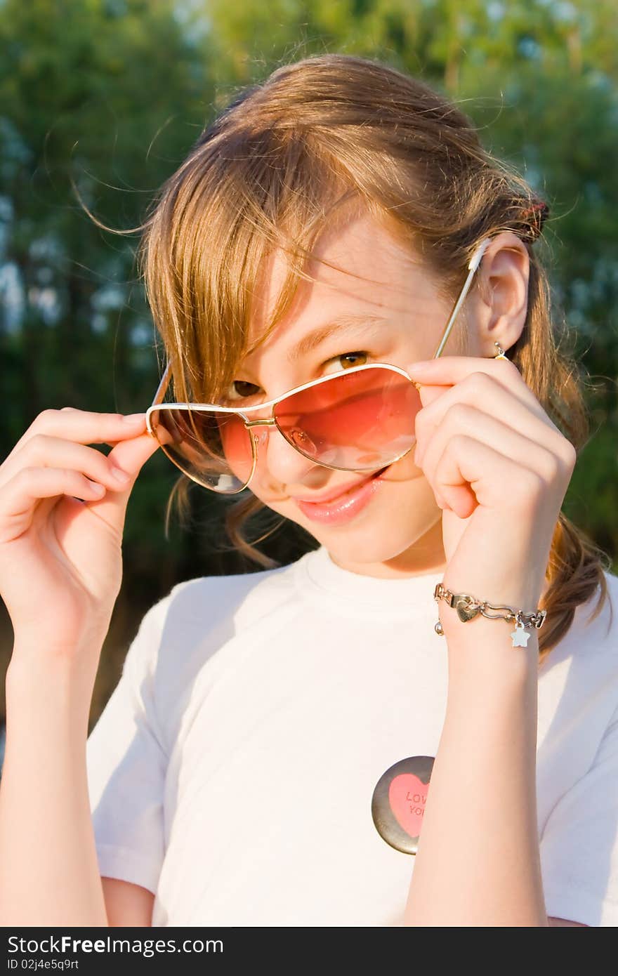 Outdoor portrait of a young girl. Outdoor portrait of a young girl