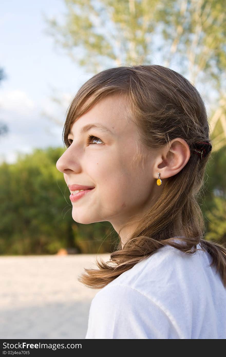 Outdoor portrait of a young girl. Outdoor portrait of a young girl