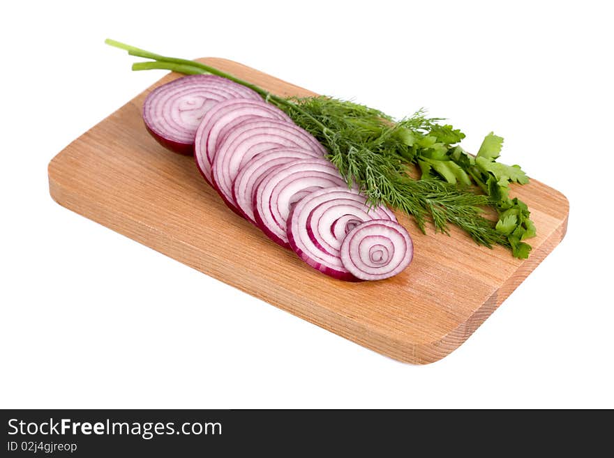 Fresh Onion Slices On A Wooden Board