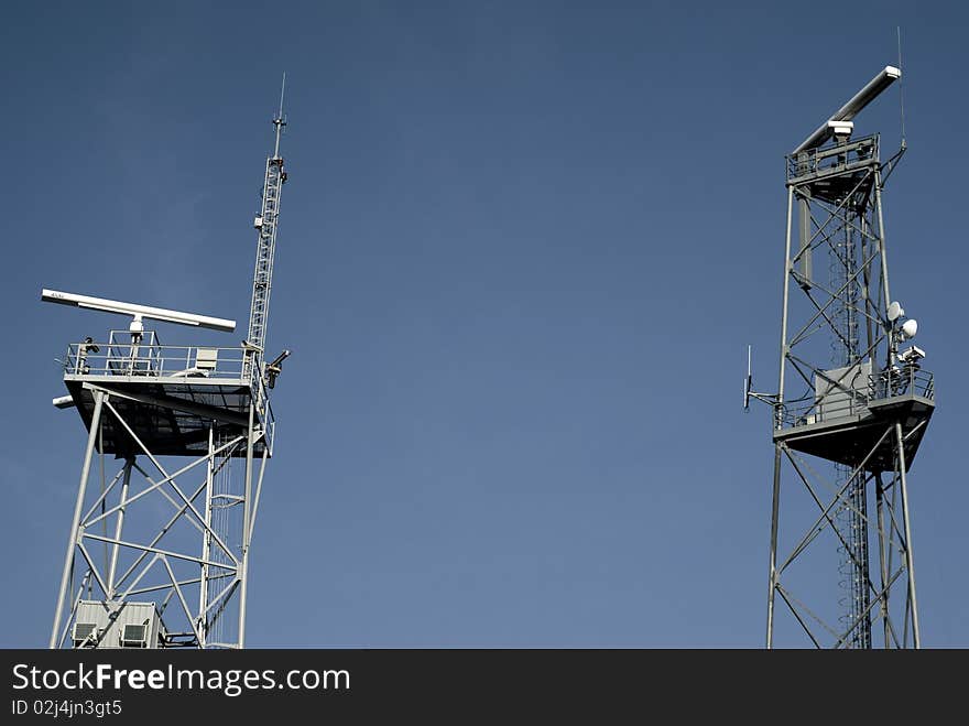 Two technical radar, blue sky