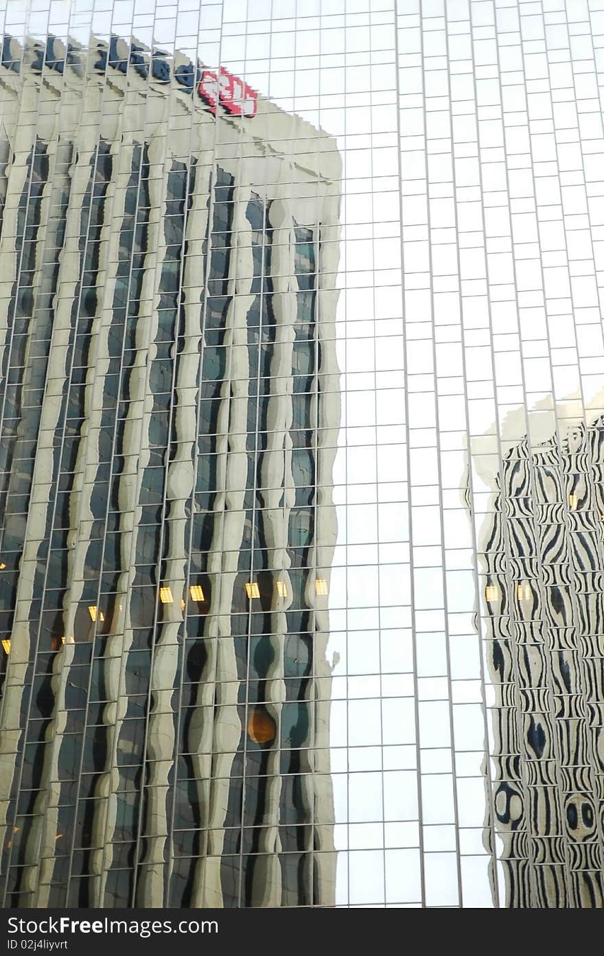 Reflections of a large office building in the business district of San Francisco