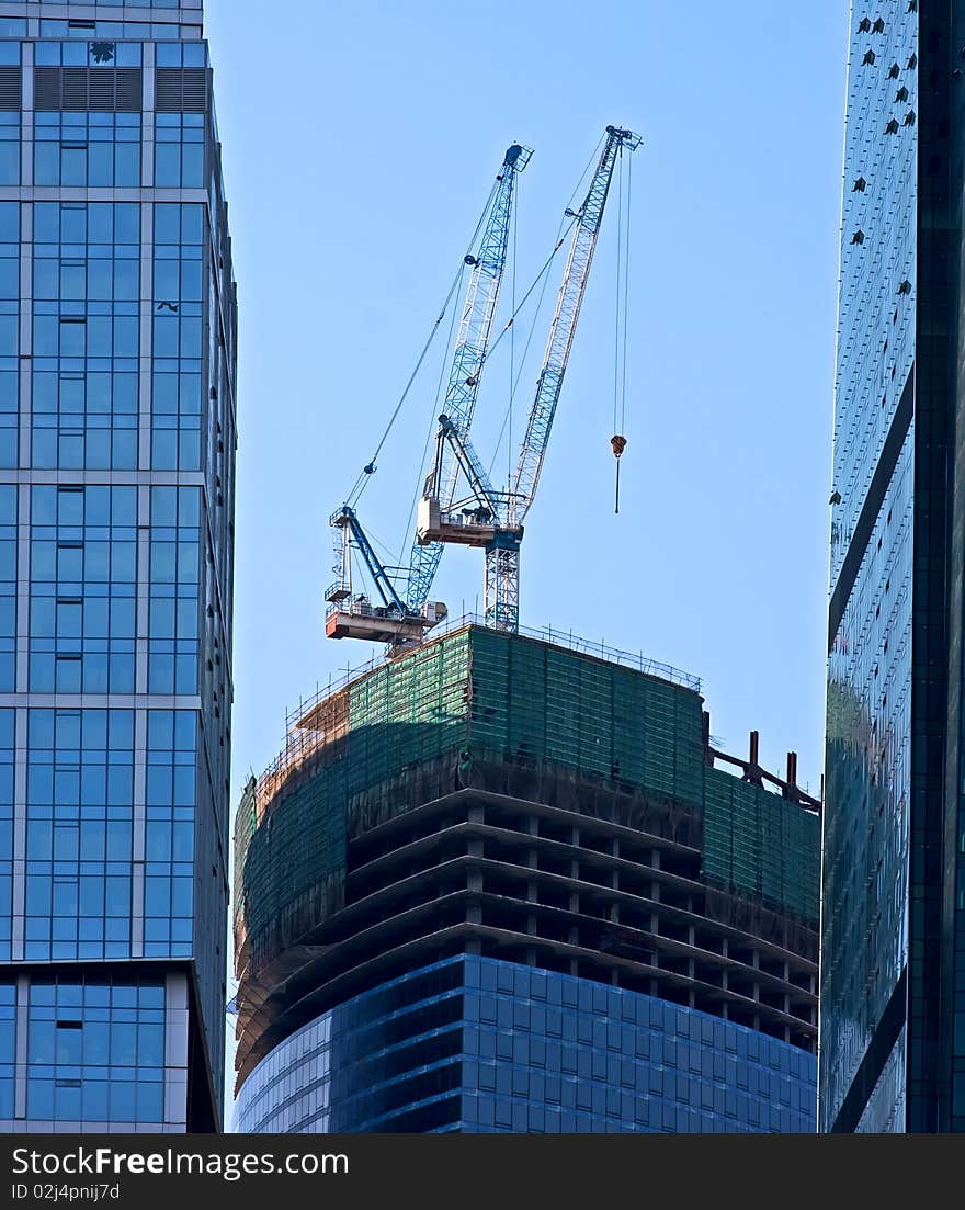 Modern business center tower construction. Modern business center tower construction