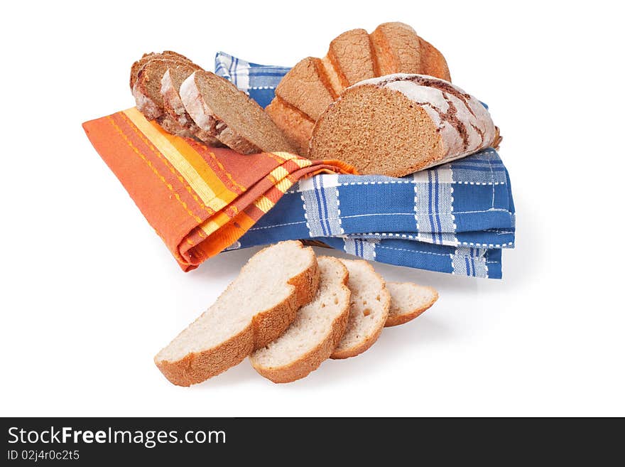 Sliced homemade brown bread, isolated on white