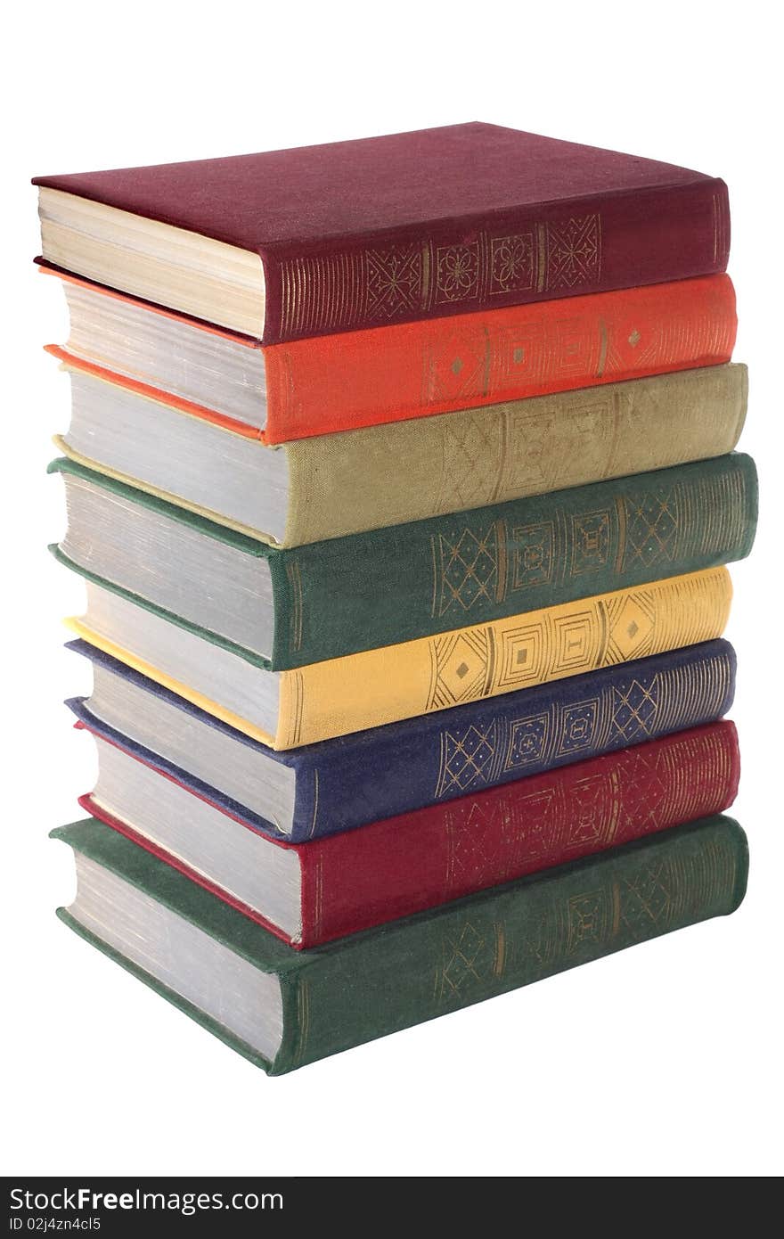 Some multi-coloured books on a white background