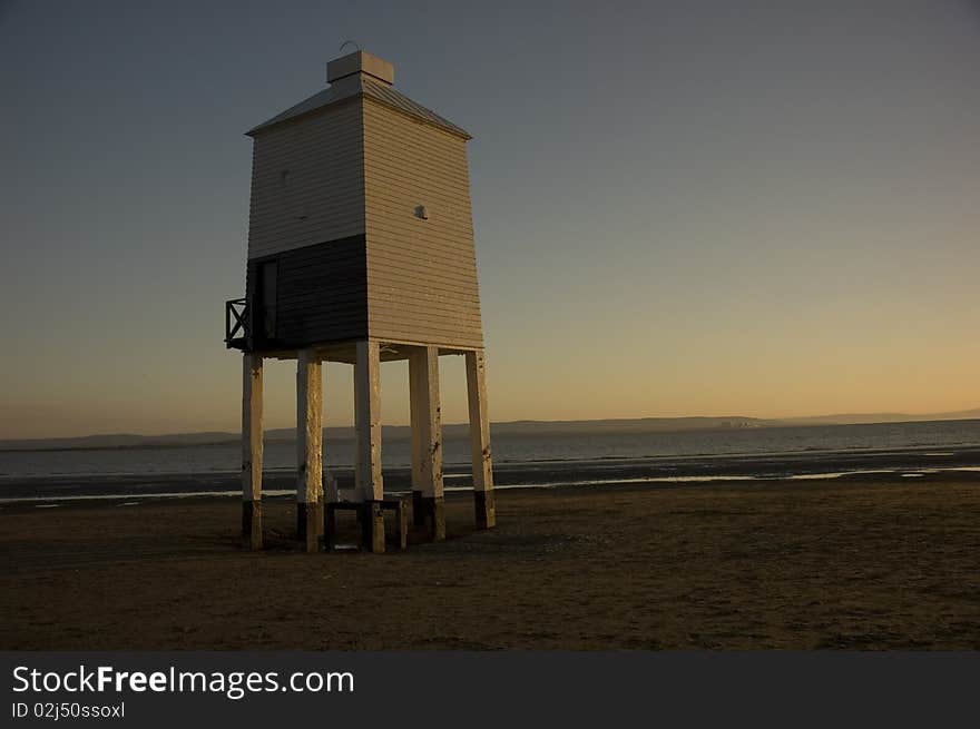 Wooden lighthouse taken at sunset. Wooden lighthouse taken at sunset.