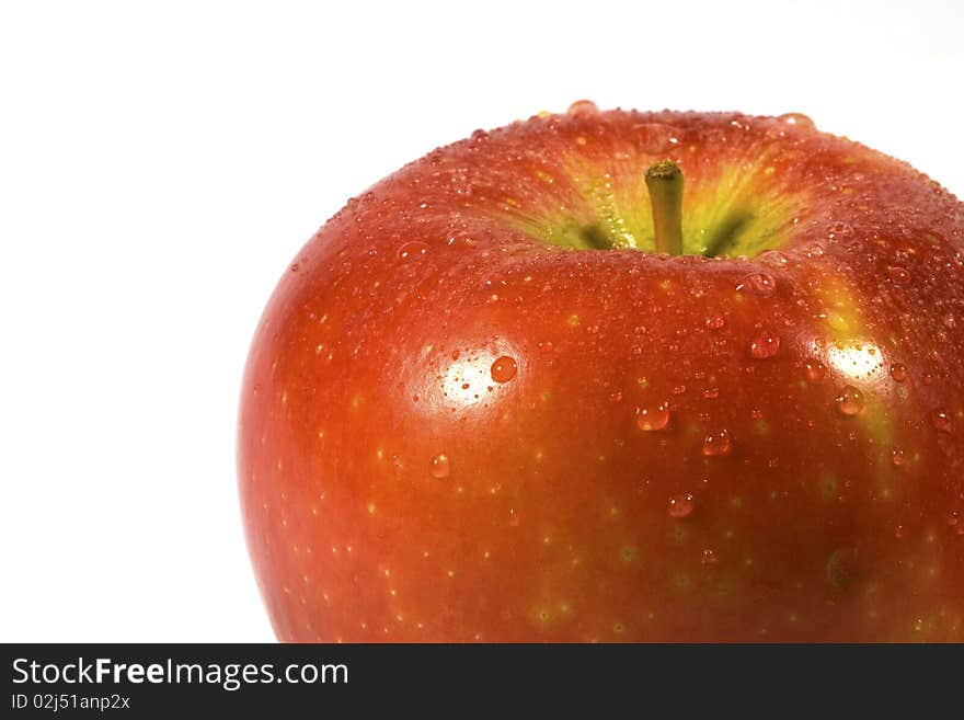 Ripe red apple on a white background