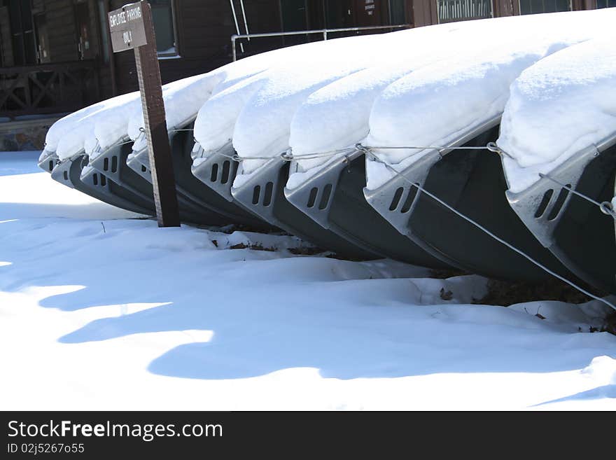 Row boats in snow