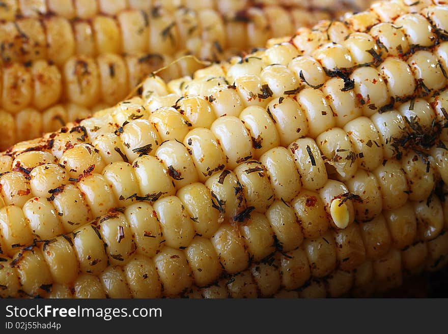 Ears of baked corn as a background. Ears of baked corn as a background.