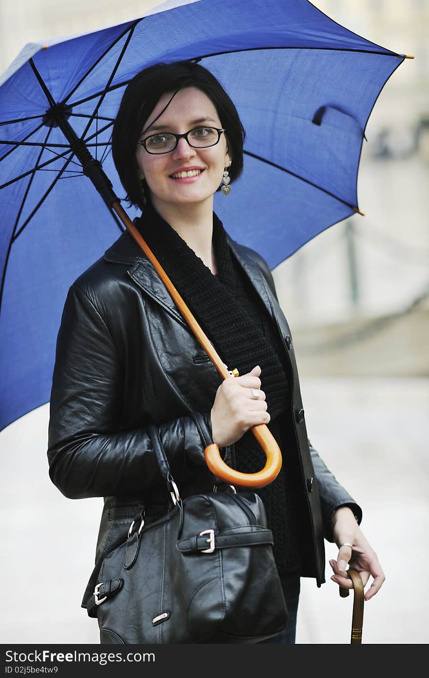 Woman On Street With Umbrella