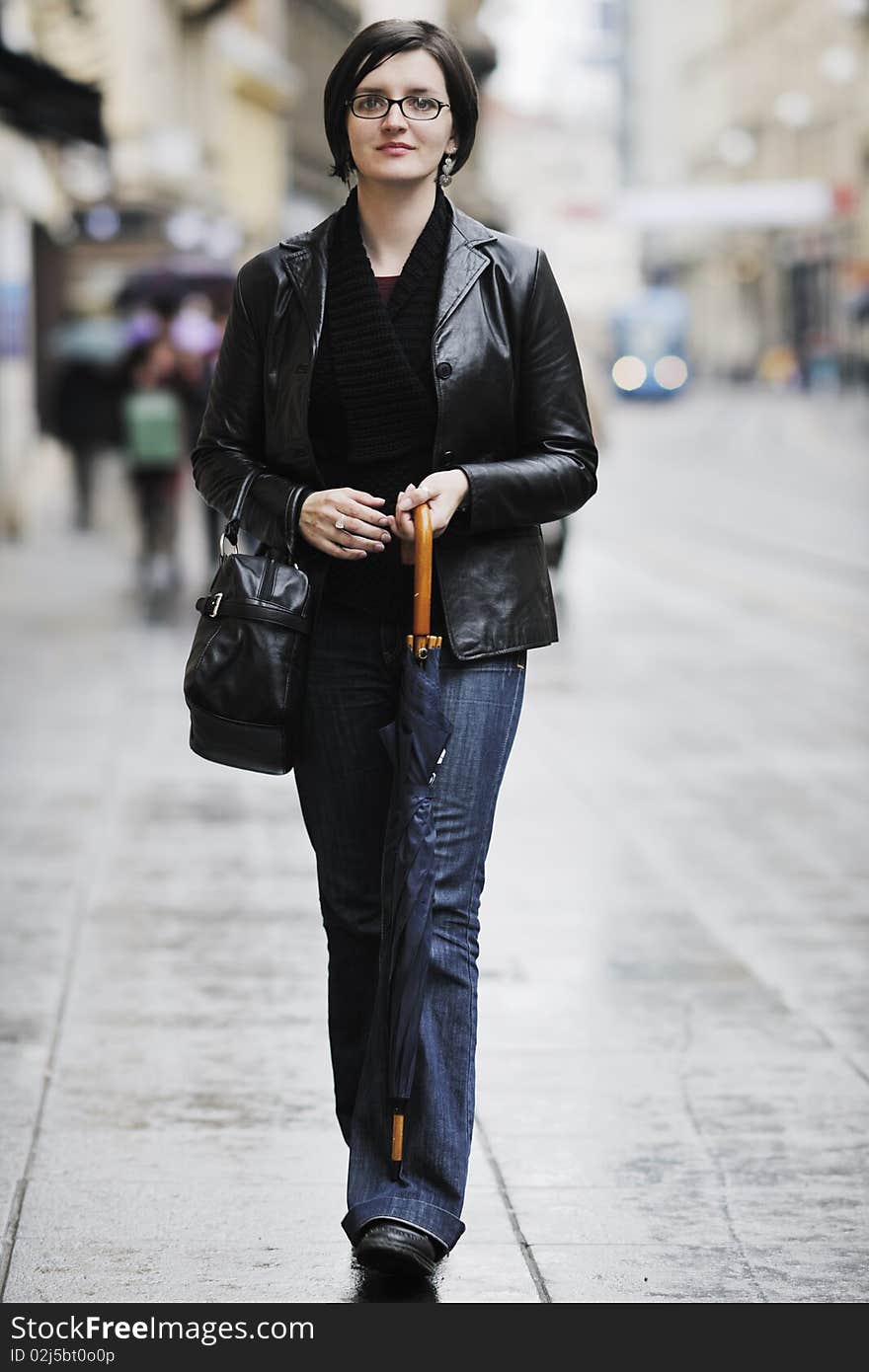 Woman On Street With Umbrella