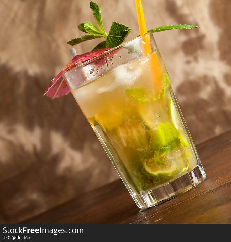 Photo of cuban mojito cocktail with brown sugar and mint