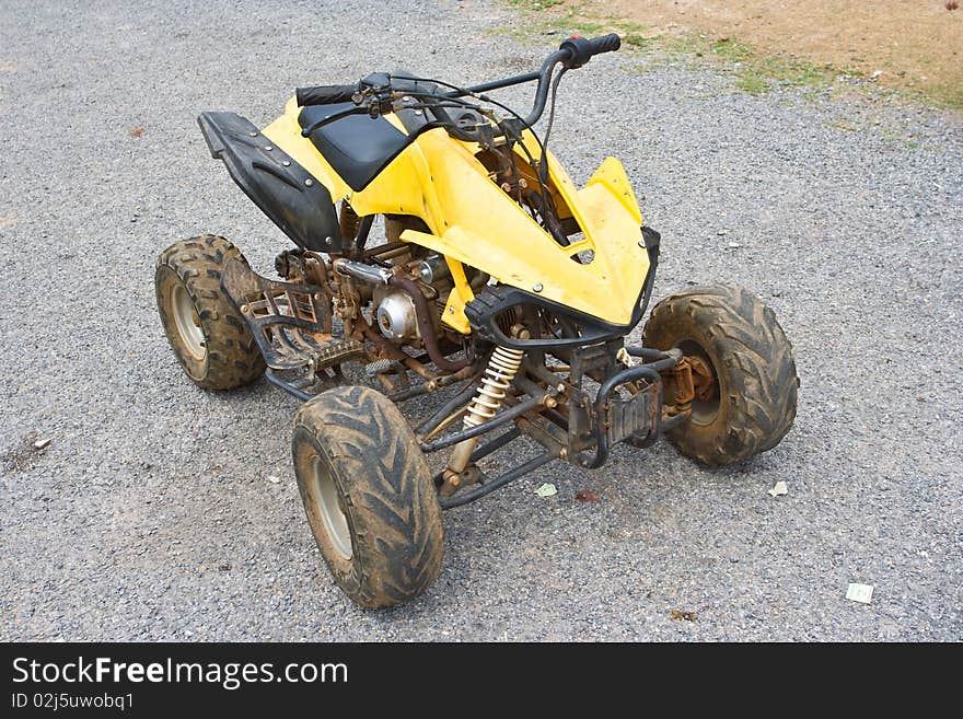 An old ATV car in a farm.