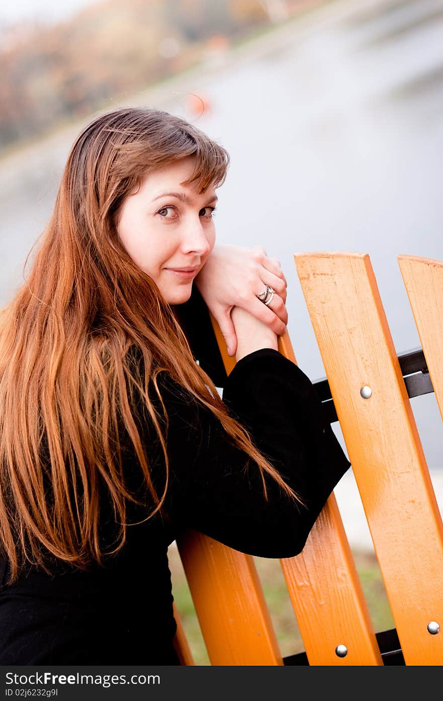 Portrait of  lady in black dress in the park