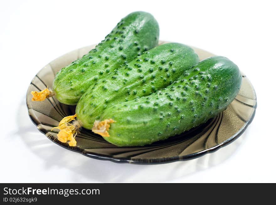 Green cucumbers on plate