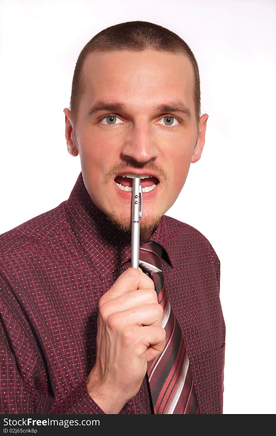 Young businessman with pen