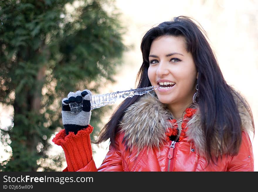 Funny girl with an icicle