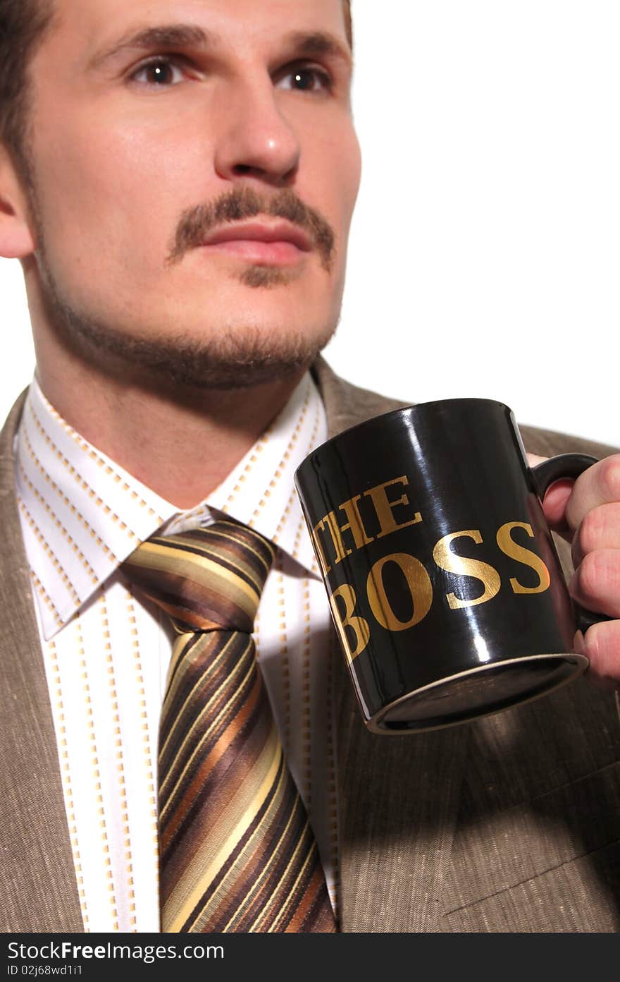 Businessman in the shirt drinking coffee. Businessman in the shirt drinking coffee