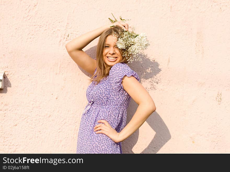 Girl with flowers standing outdoor