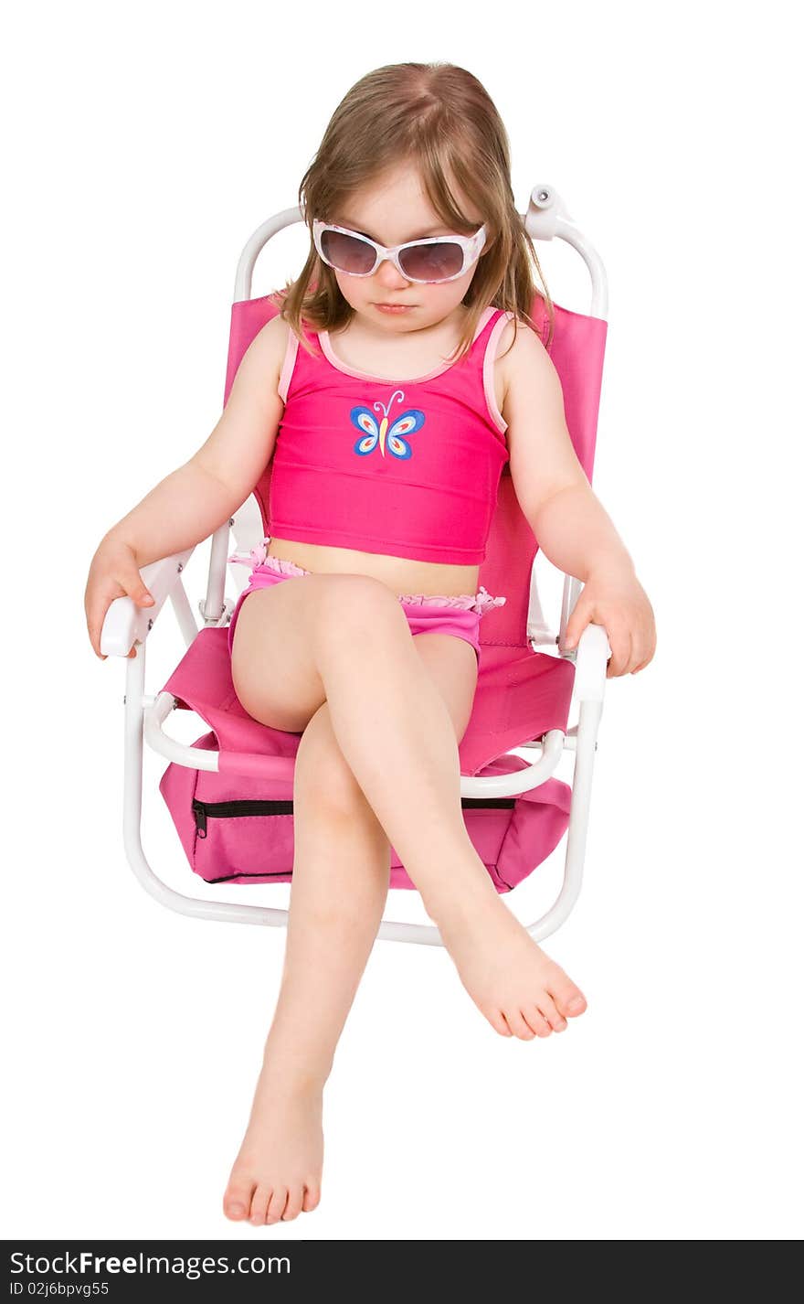 Sweet happy little girl on the beach isolated