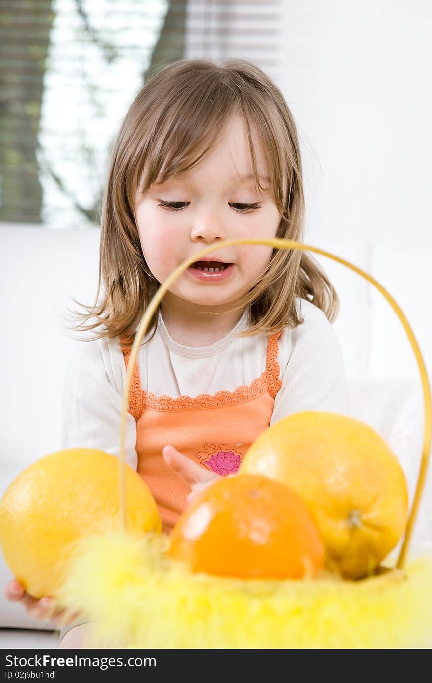 Little Girl With Fruits