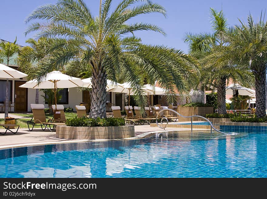 Swimming pool on a sunny day.Thailand . Swimming pool on a sunny day.Thailand .