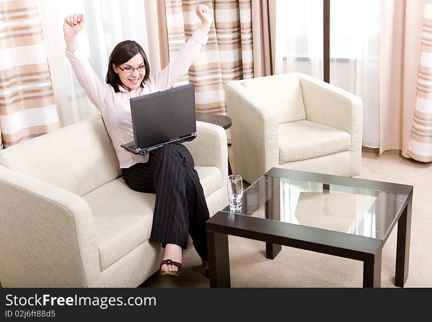 Young attractive business woman with laptop. Young attractive business woman with laptop