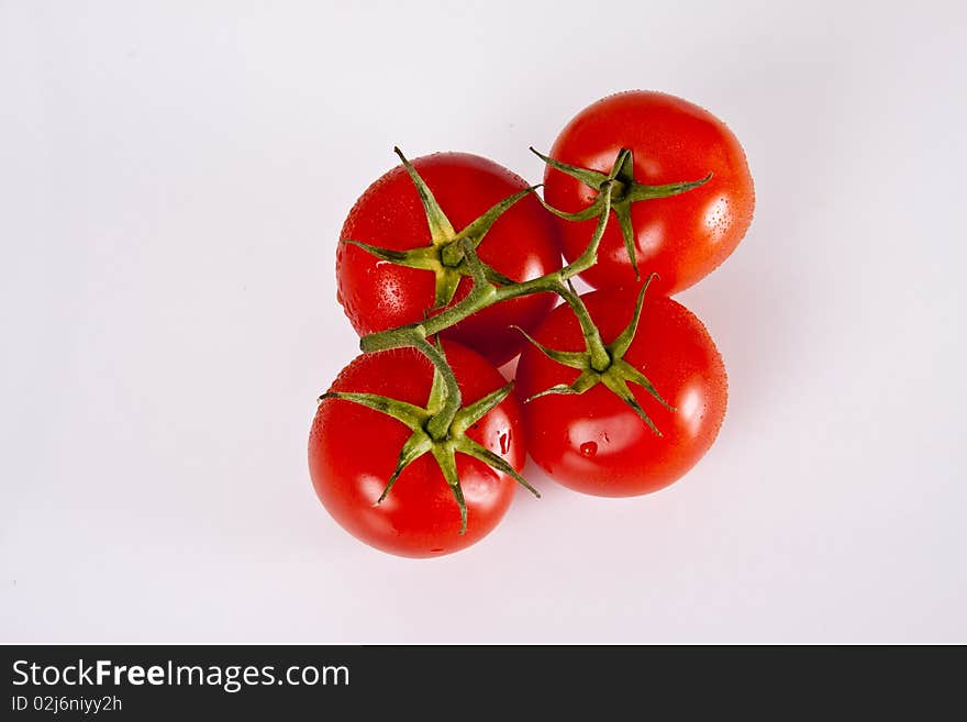 Tomatoes viewed from top on the white background