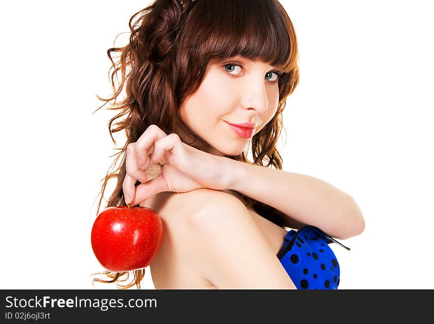 Portrait of a beautiful brunette with a red apple